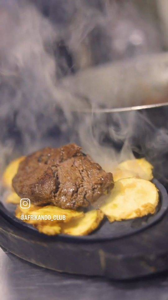 Sizzling steak with plantain